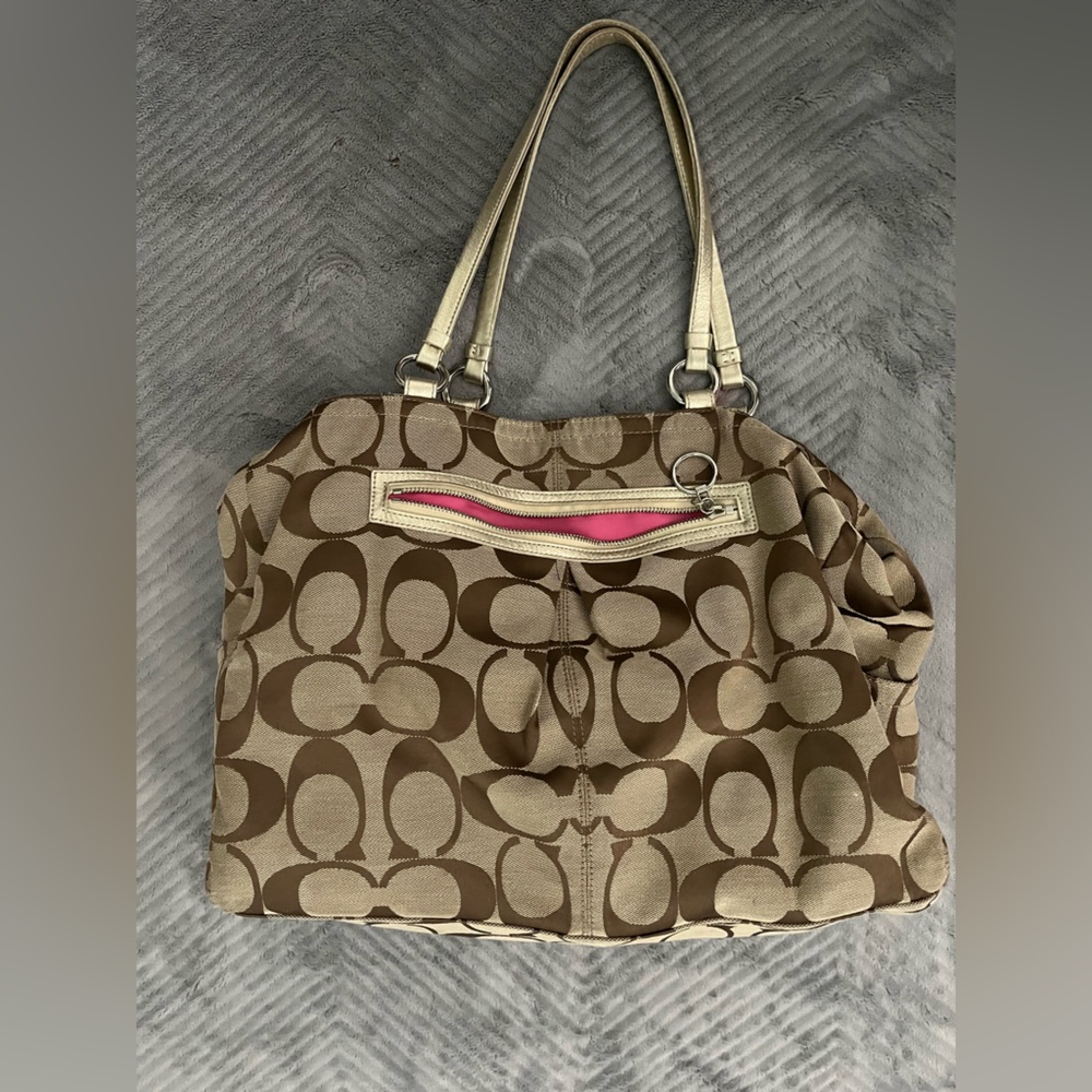 Coach tote bag also can be used for a diaper bag. Lightly worn.